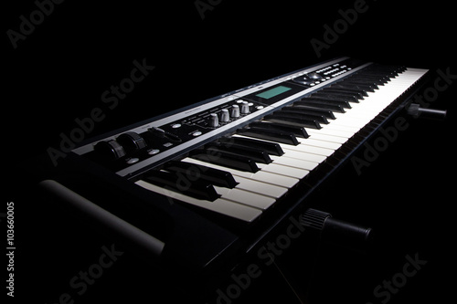 Schilderij op canvas Synthesizer in shadow