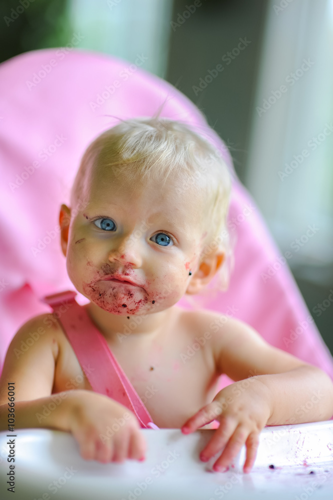 Baby Girl eating berries