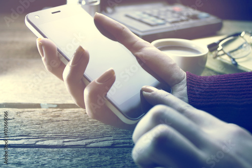 woman hand phone and coffee