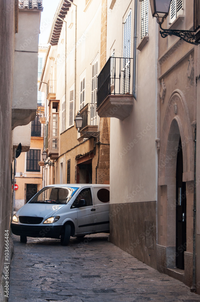 Car in a narrow streets of the old city