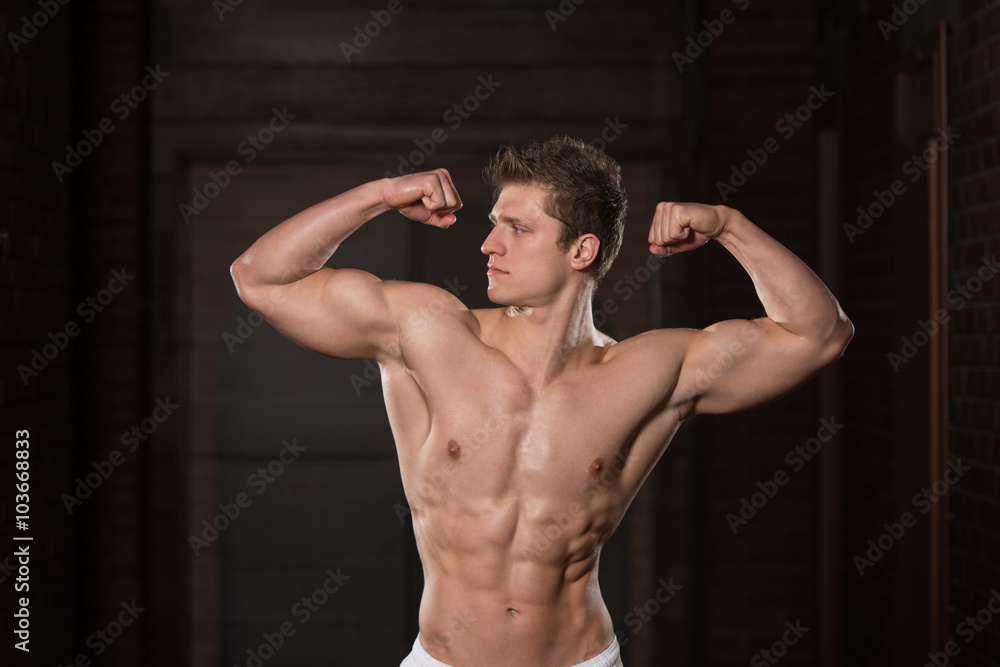 Healthy Man Showing His Well Trained Biceps