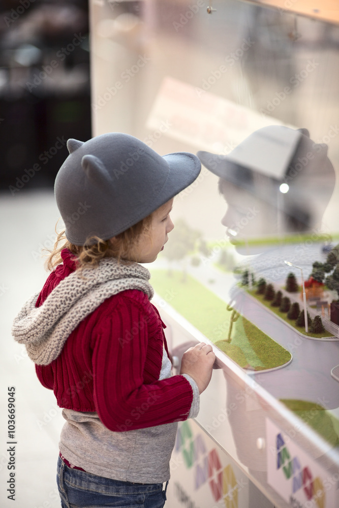 baby girl considering  layout  showcase shopping center