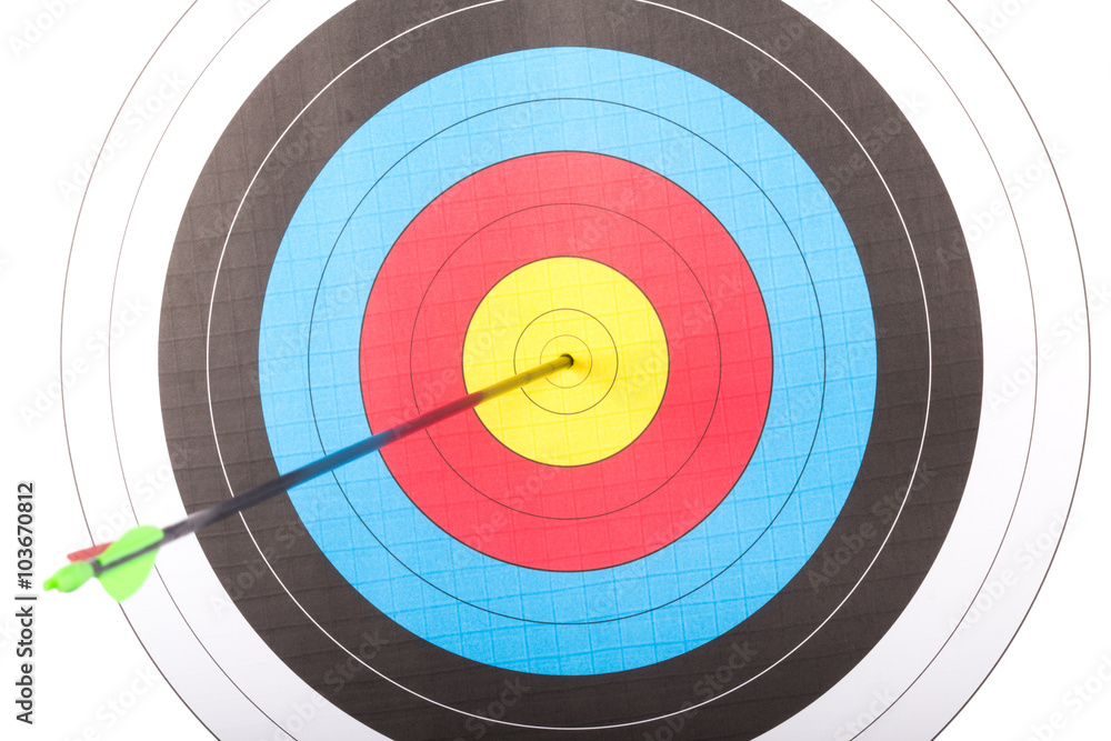 Arrow hit goal ring in archery target Arrow hit goal ring in archery target