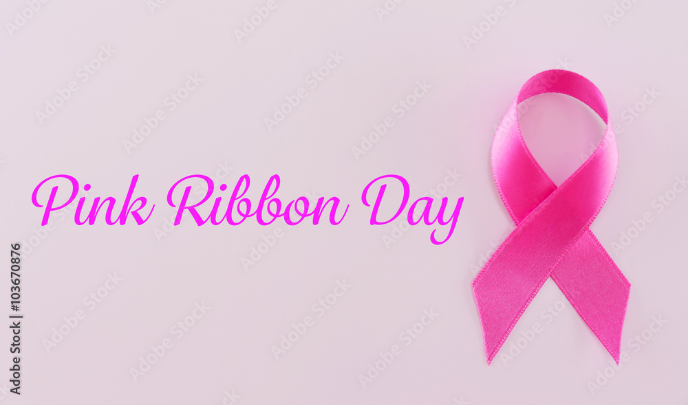 Satin ribbon sign on pink background Satin ribbon sign on pink background
