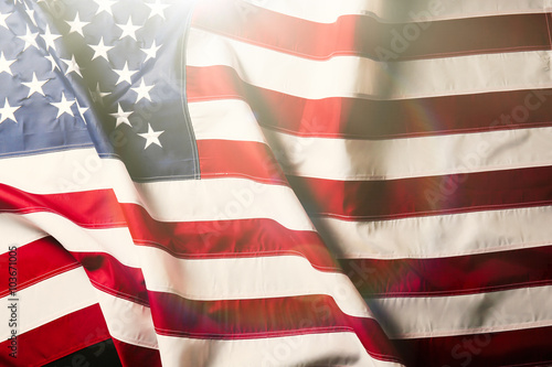 American flag background with sunlight