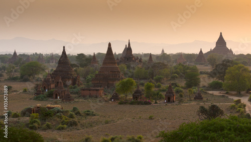 Pagoda under a warm sunset in the plain of Bagan  Myanmar  Burma 