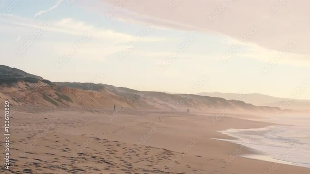 Ocean waves and a beautiful sunset at the beach of Santa Cruz, California, Panorama Ocean waves and a beautiful sunset at the beach of Santa Cruz, California, Panorama