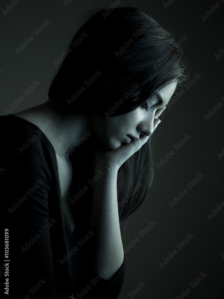 Sad lonely depressed young woman