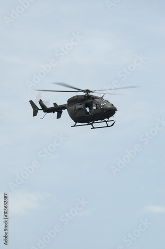 UH-72A Lakota flies over head with doors open