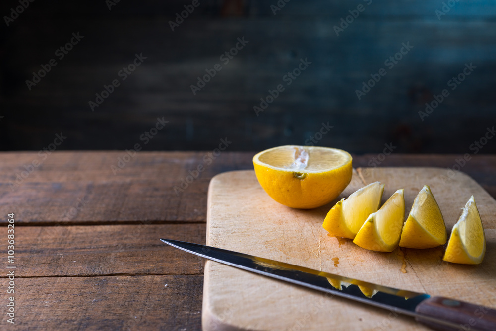 lemons cut on a cutting board