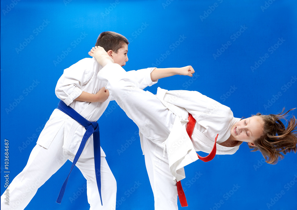 Children are training punch arm and roundhouse kick leg Children are training punch arm and roundhouse kick leg