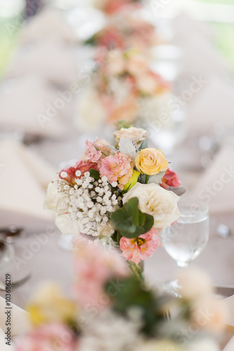 Fototapeta Naklejka Na Ścianę i Meble -  Beautiful flowers as dining table decoration