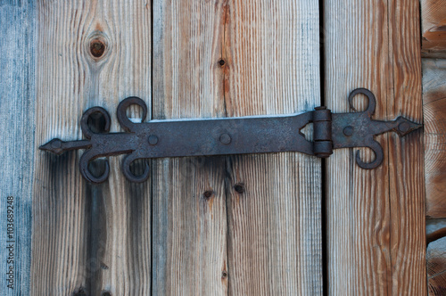 old rusty hinge on the door