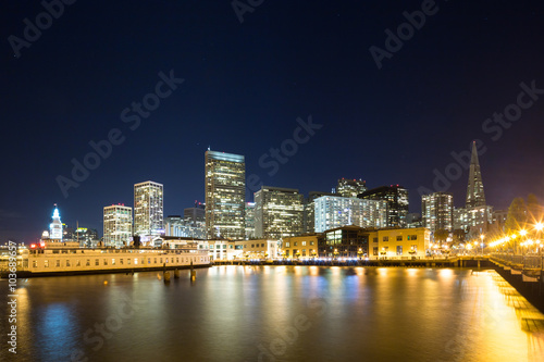 water with cityscape of San Francisco at night