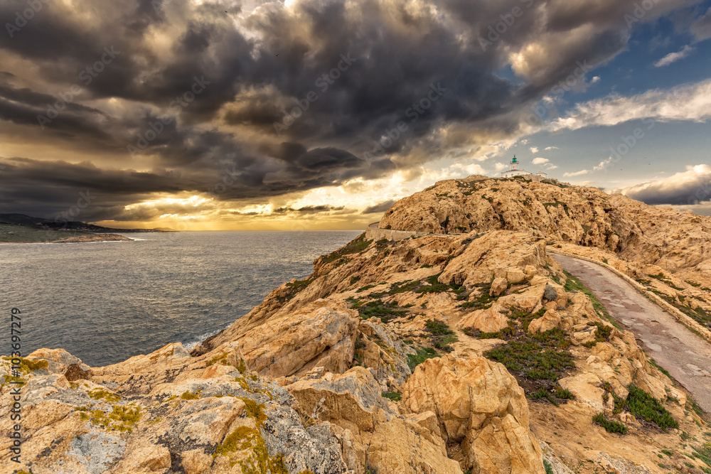 Moody skies over the lighthouse at Ile Rousse in Corsica
