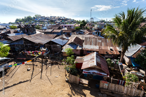 poor houses by the river in shantytown