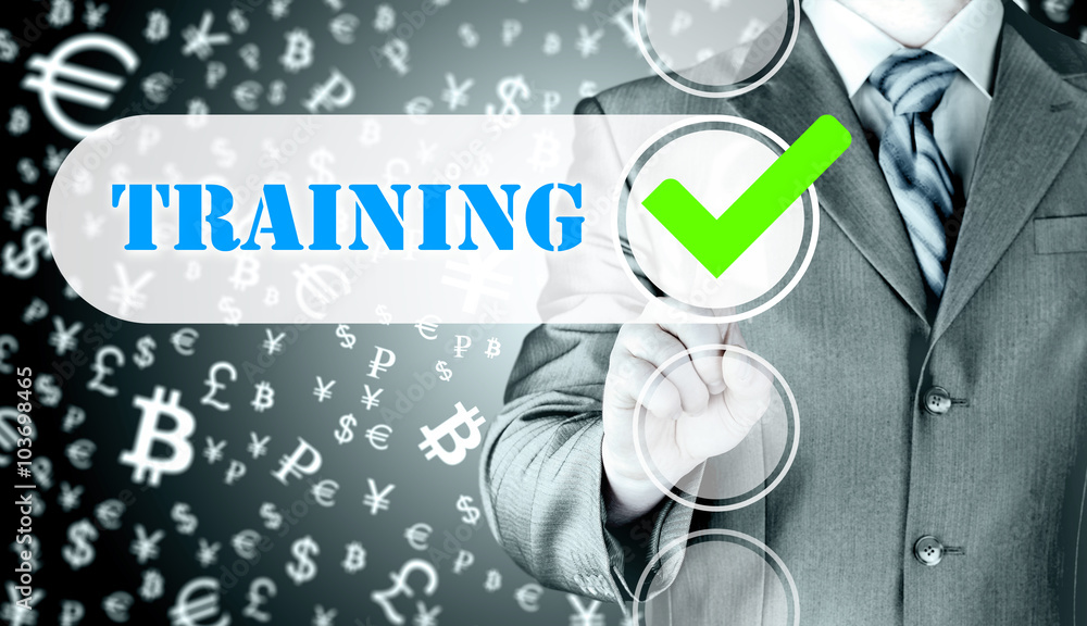 Businessman pressing touch screen interface training checkbox Businessman pressing touch screen interface training checkbox
