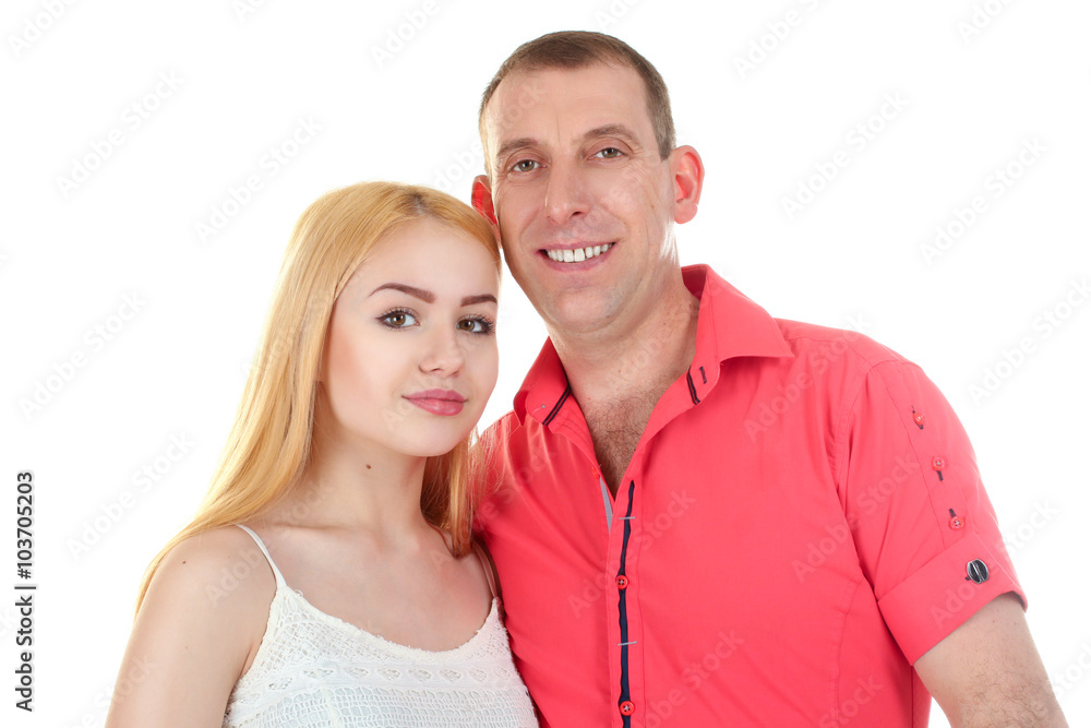 the father hugs the beautiful and beloved daughter isolated on white background