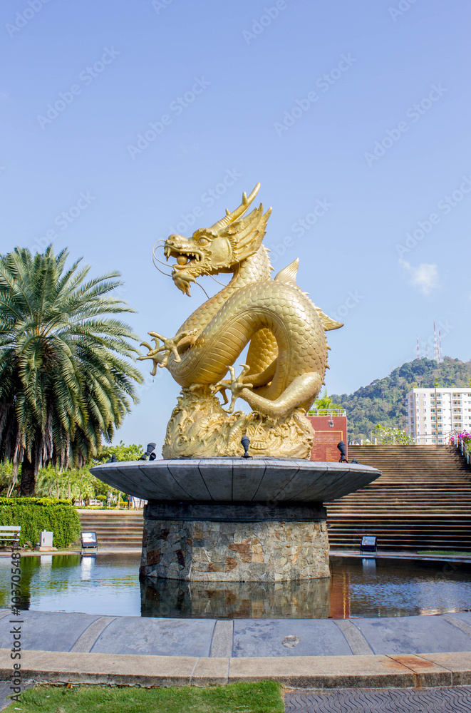 gold dragon statue at 72nd Anniversary Queen Sirikit Park