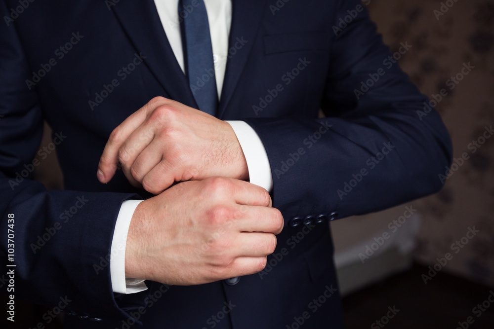 Mans hands with cufflinks. Elegant gentleman clother