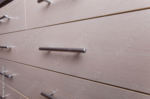 wooden wardrobe drawer front, metal handle