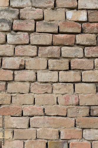 Old red bricks wall as background