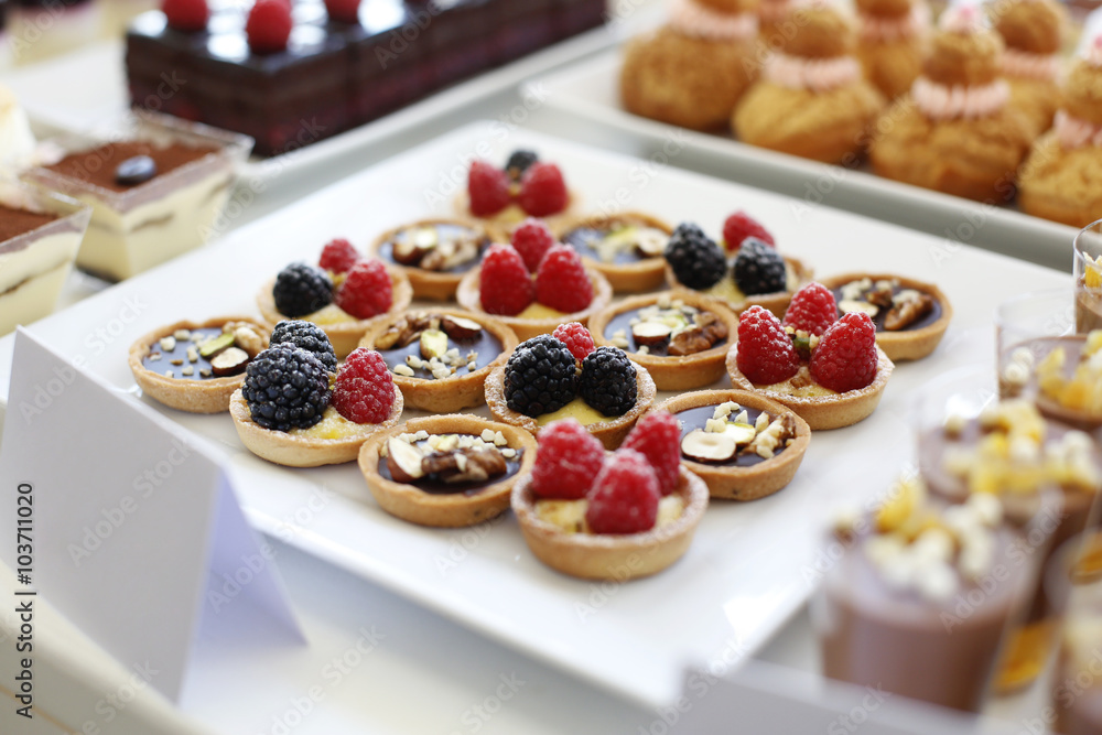 Fototapeta premium Desserts on a table at a ceremony