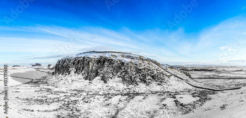 Hadrian's Wall rising over Peel Crag, Northumberland, England