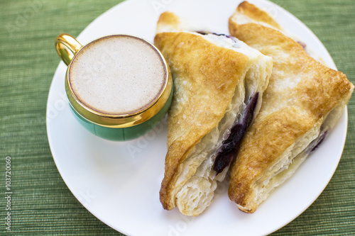 Cappuccino and blueberry cobbler puff pastry breakfast