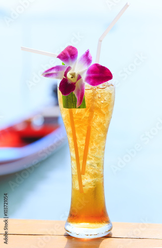 Ice tea. Tropical cocktail on long tail background Thailand Samui