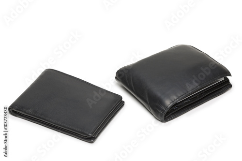 Small empty and big full wallet on white