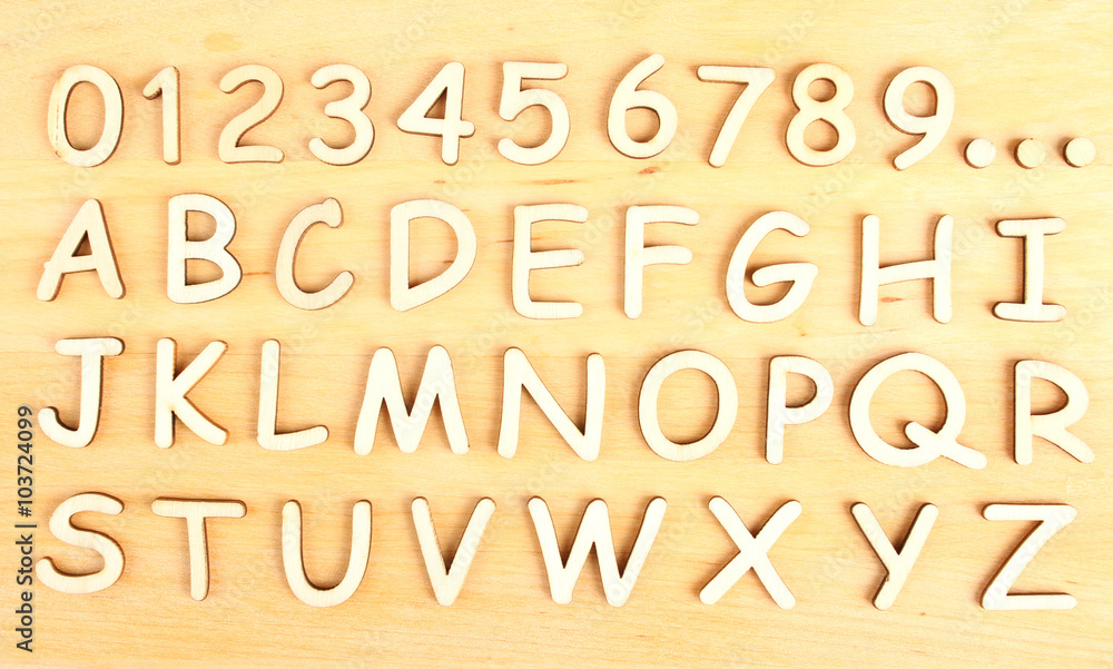 Wooden alphabet. Include numerals.