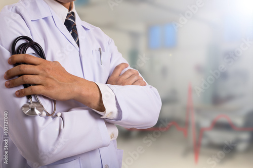 .Doctor holding stethoscope