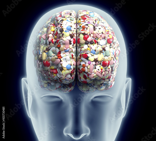 xray of human head with pills and drugs for brain.