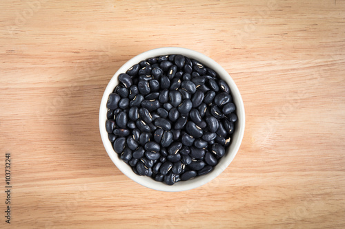 bowl of black bean on the wood background