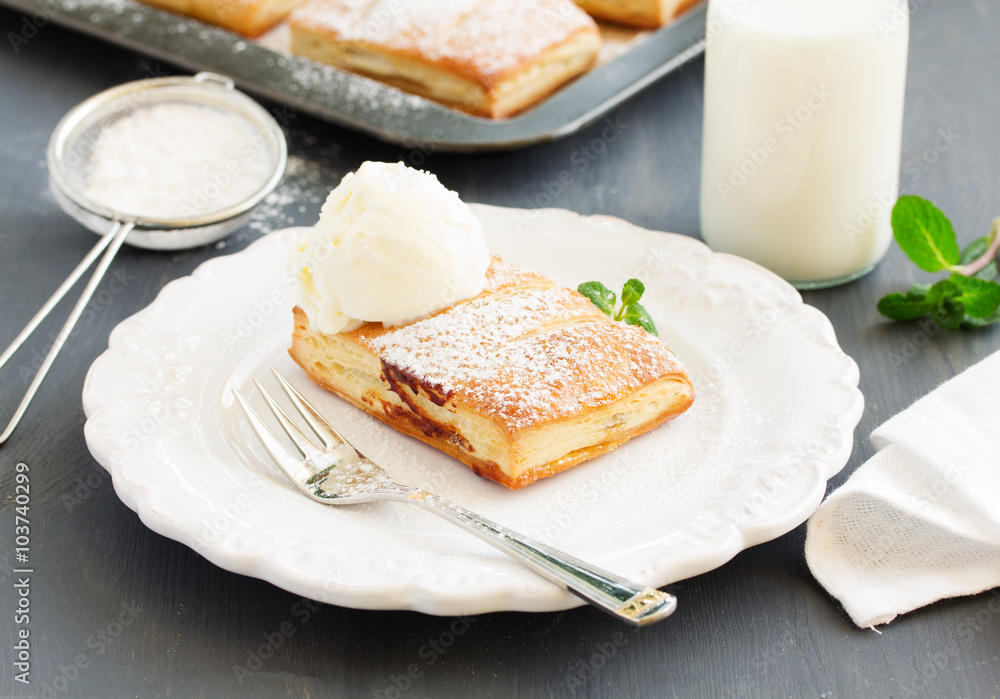 Homemade cakes and puff pastry with apples and caramel.