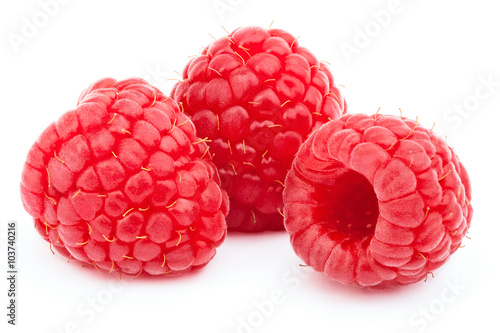 Three ripe raspberries isolated on white background with clipping path