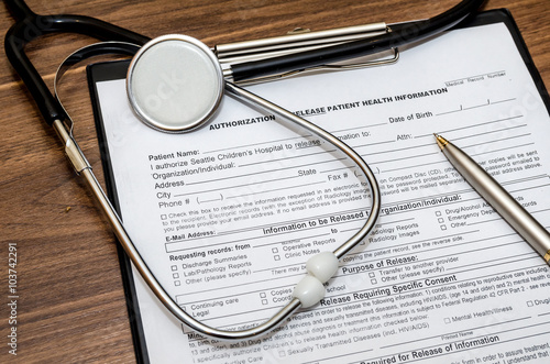 patient information blank with pen and stethoscope