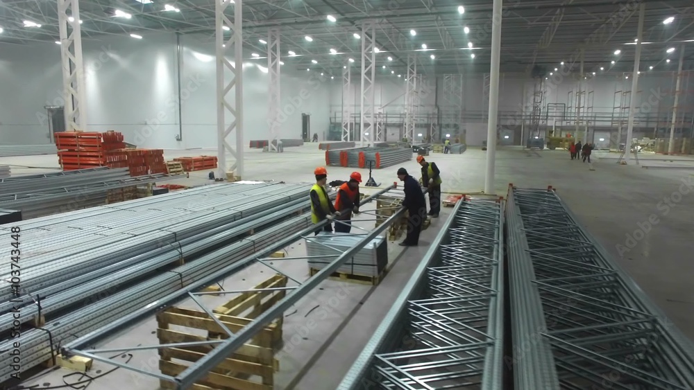 aerial view inside a large new modern industrial warehouse aerial view inside a large new modern industrial warehouse