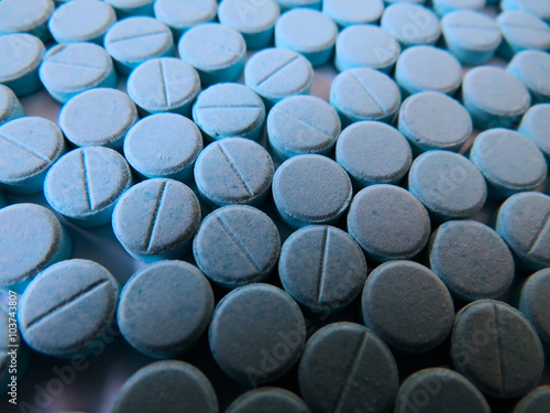 Closeup of blue pills