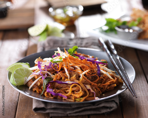tasty pad thai stir fry with beef and colorful garnish