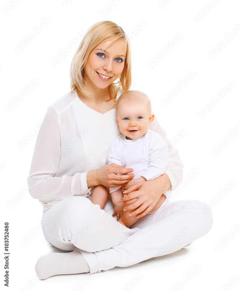 Happy smiling mother with baby sitting together on white backgro Happy smiling mother with baby sitting together on white backgro