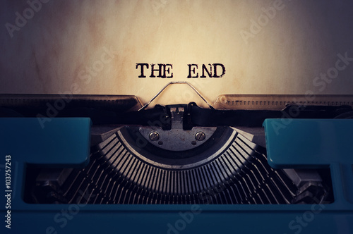 retro typewriter and text the end photo