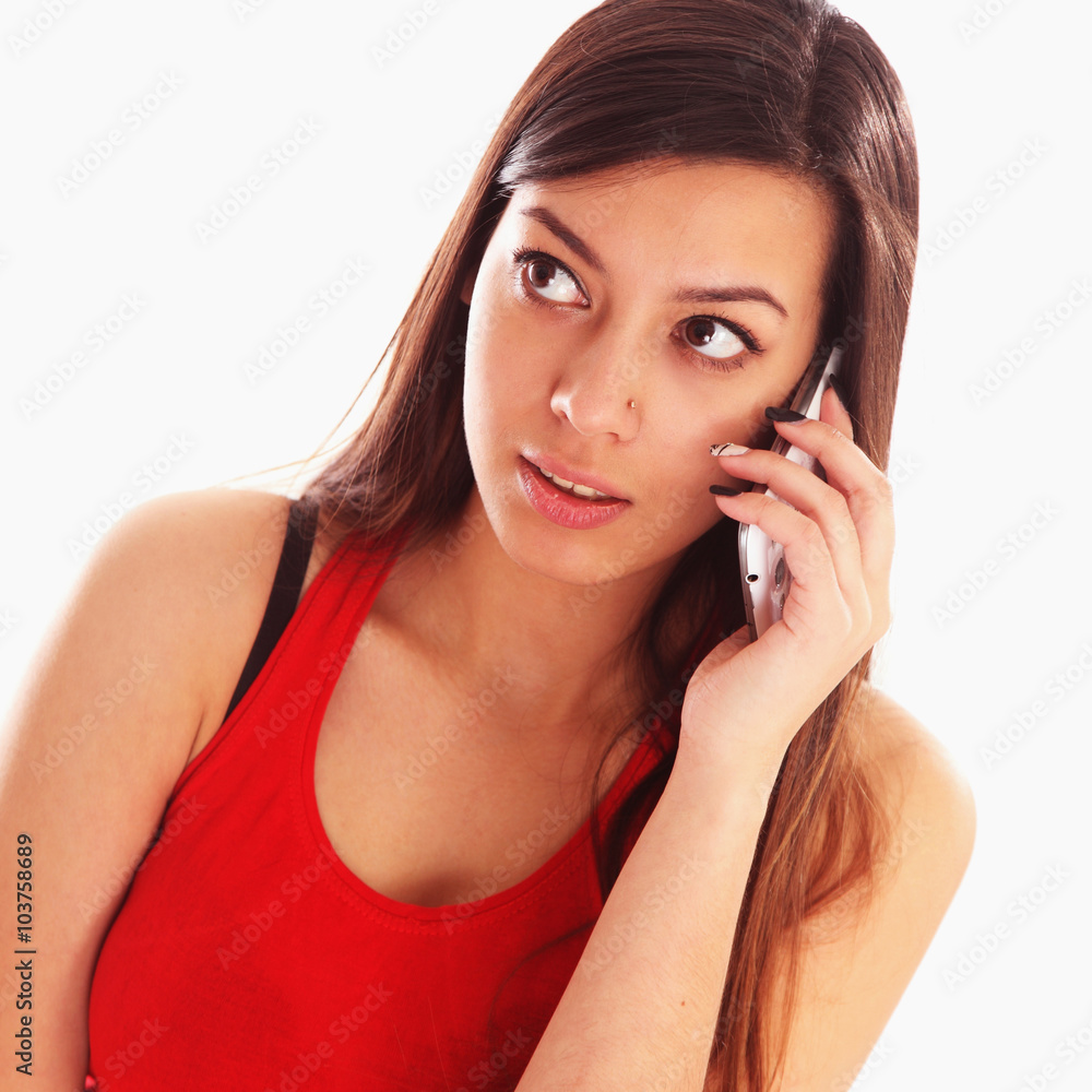 Beautiful young happy woman smiling during a phone call Beautiful young happy woman smiling during a phone call