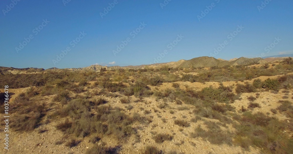 4K Aerial, Flight over a dry riverbed in a desert in Andalusia, Spain - Shot is additionally stabilized, graded and mostly accelerated. Watch also for the native versions 4K Aerial, Flight over a dry riverbed in a desert in Andalusia, Spain - Shot is additionally stabilized, graded and mostly accelerated. Watch also for the native versions