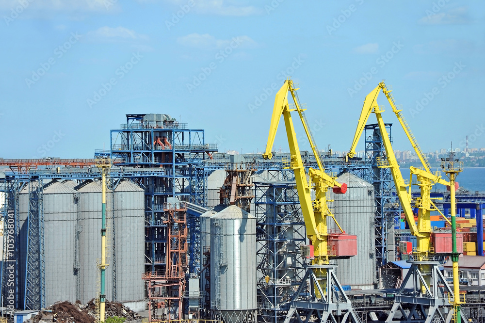 Cargo crane and grain dryer in port Odessa, Ukraine Cargo crane and grain dryer in port Odessa, Ukraine
