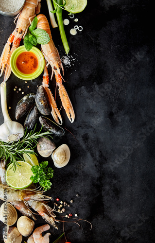 Fresh Seafood and Ingredients on Dark Background