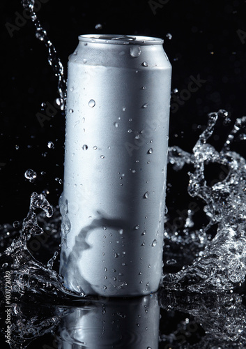 beer can with water splashes