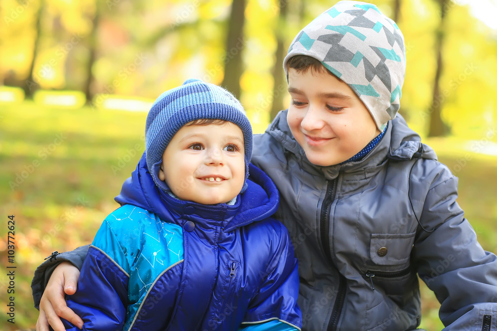 A group of boys in the Park. hug. Laugh. A group of boys in the Park. hug. Laugh.