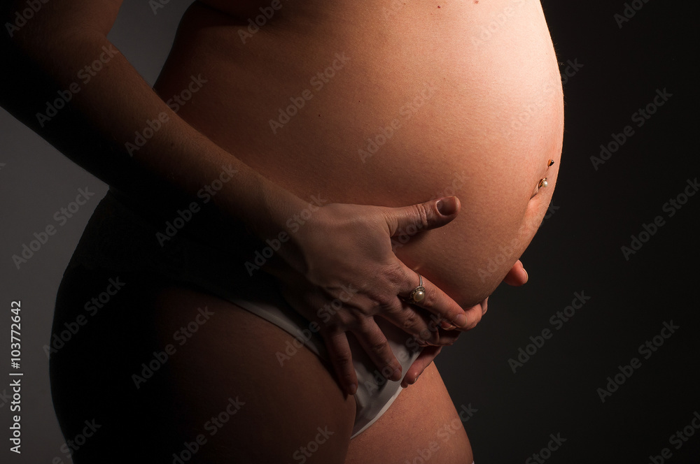 belly of a pregnant woman